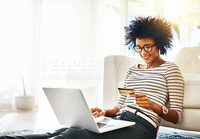Buy stock photo Young woman, laptop and credit card while doing online shopping sitting on ground. Home, happiness and computer internet deal of African female person on an ecommerce app reading banking details