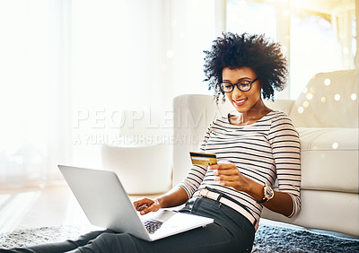 Buy stock photo Young woman, laptop and credit card with bokeh doing online shopping sitting on ground. Home, happiness and computer of happy African female person on a web ecommerce app reading an internet deal