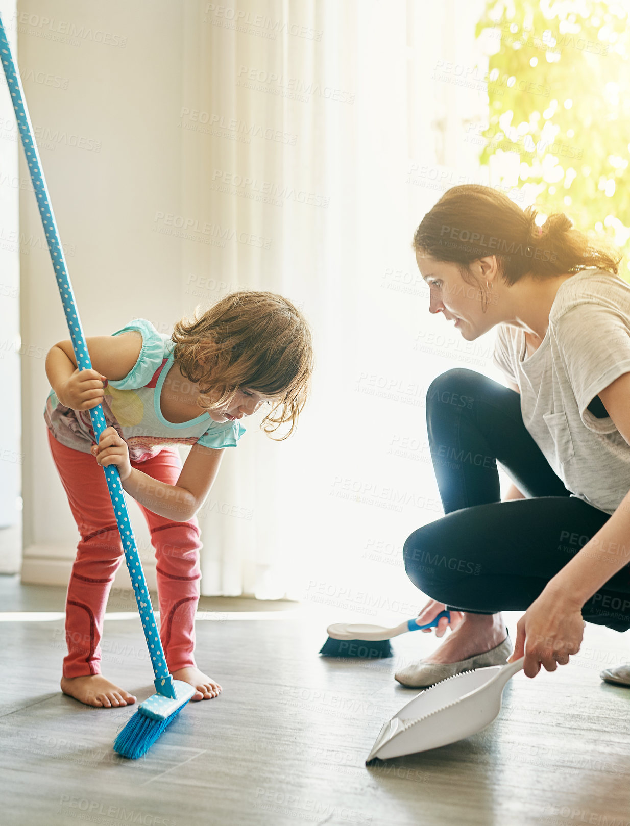 Buy stock photo Broom, sweeping and mother with daughter in home for chores, teaching and learning hygiene routine. Housekeeping, mom and girl cleaning dust on floor together with support, care and child development