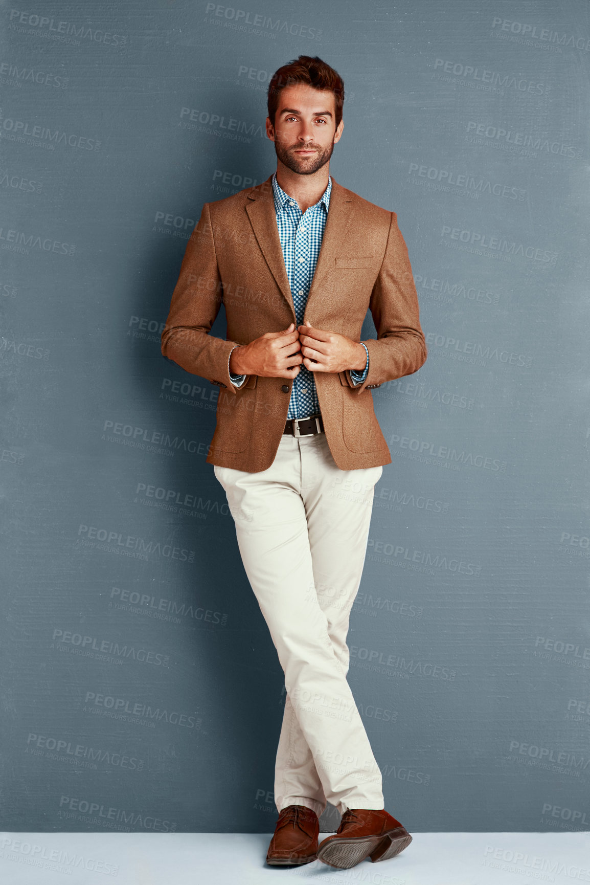 Buy stock photo Trendy, fashion and portrait of man with confidence, creative and professional pride in studio. Businessman, cool style and male model on grey background with wall, opportunity and designer clothes