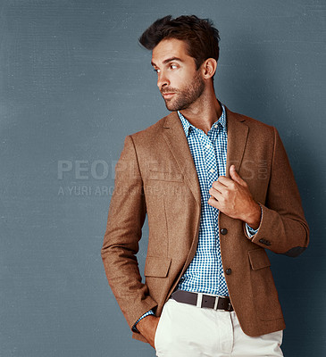 Buy stock photo Relax, fashion and man with confidence, creative thinking and professional in studio. Business, trendy style and proud businessman on grey background with insight, opportunity and designer clothes