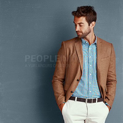 Buy stock photo Relax, fashion and man with confidence, thinking and creative professional in studio. Business, trendy style and businessman on grey background with insight, opportunity and ideas in designer clothes