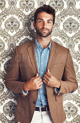Buy stock photo Portrait, confidence and man in suit on a wallpaper background isolated in studio for vintage fashion. Serious, style and male person in blazer, clothes or retro pattern of classy model in Canada