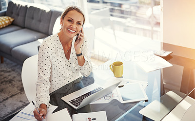 Buy stock photo Cropped shot of a mature businesswoman working from her home office