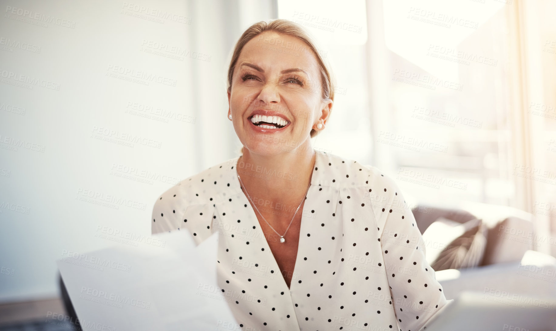 Buy stock photo Cropped shot of a mature businesswoman working from her home office