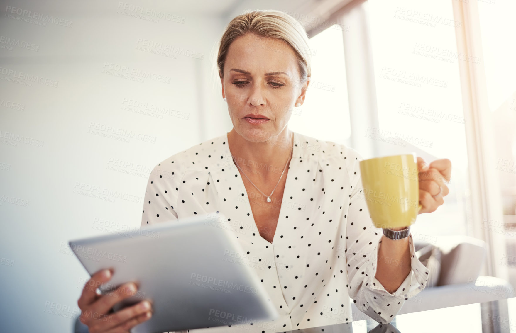 Buy stock photo Coffee, woman and tablet for remote work from home,  serious and creative article. Mature person, copywriting or journalist with research for column, online reading or email for feedback or internet