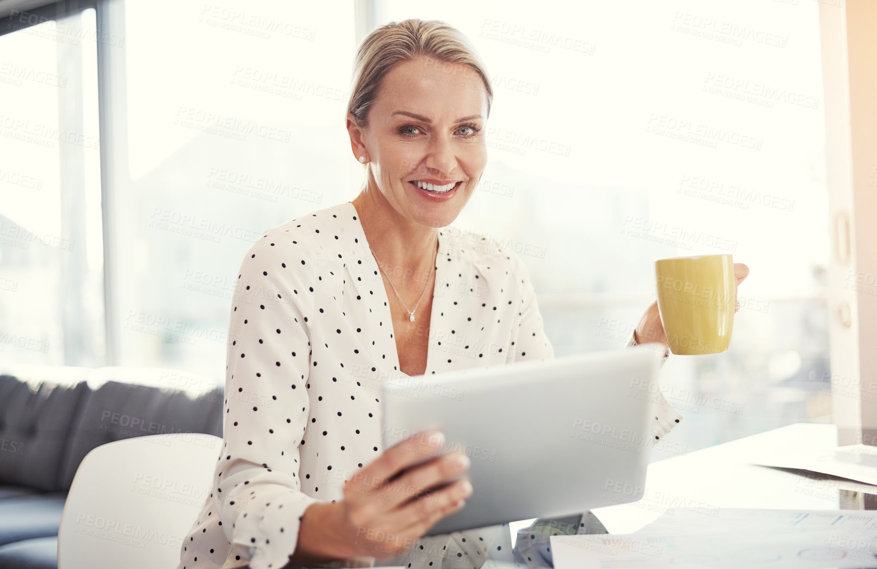 Buy stock photo Cropped shot of a mature businesswoman working from her home office