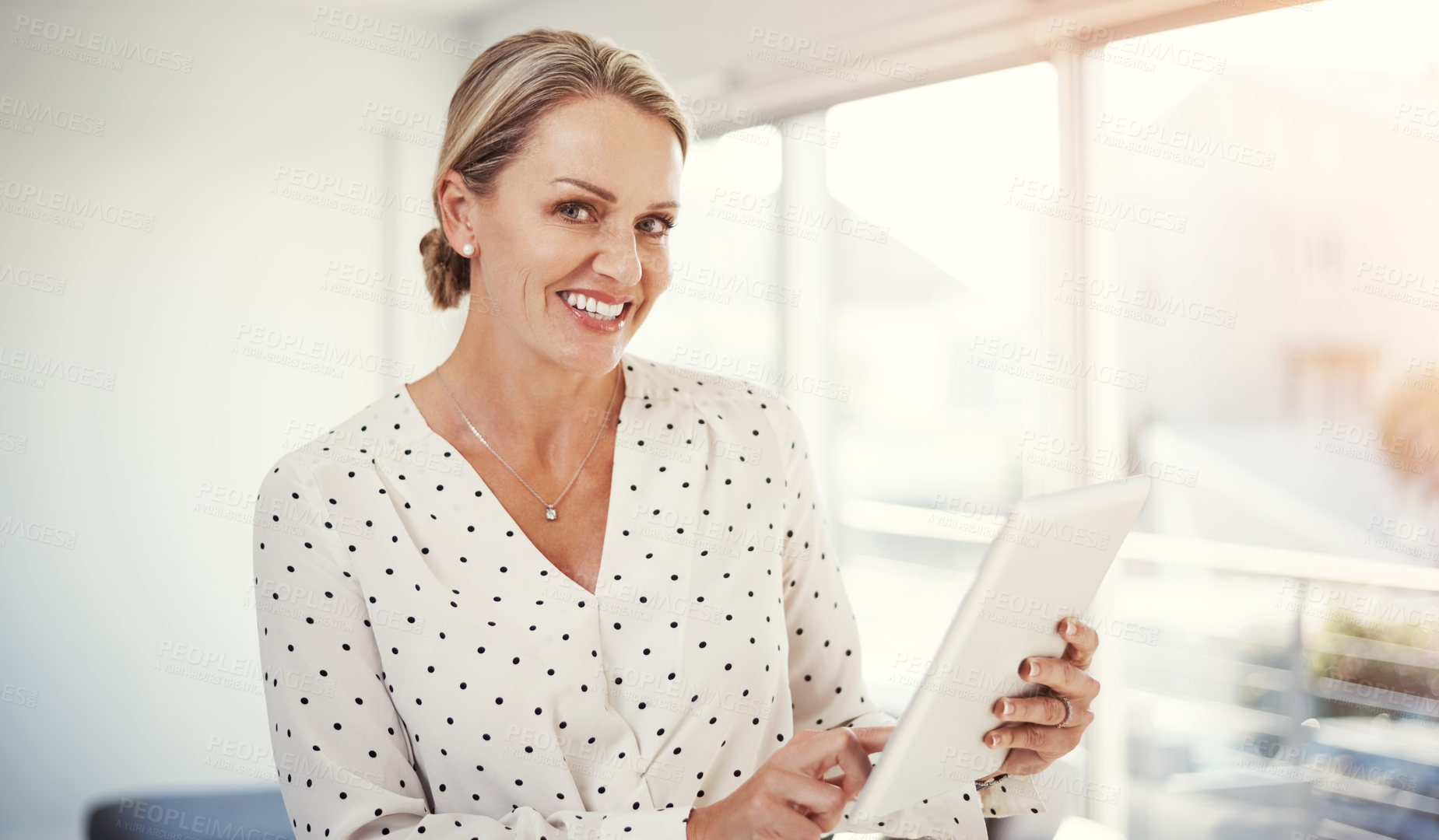 Buy stock photo Cropped shot of a mature businesswoman working from her home office