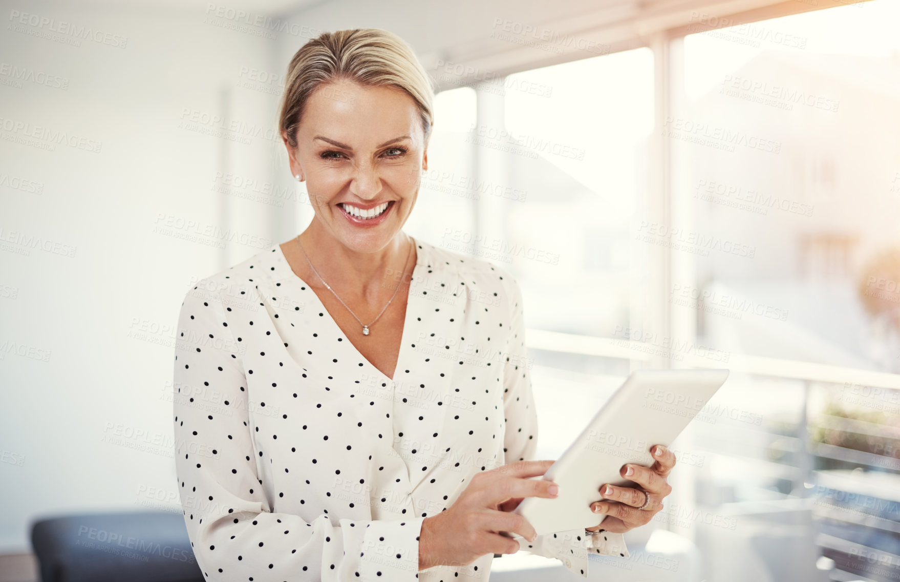 Buy stock photo Cropped shot of a mature businesswoman working from her home office