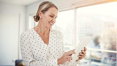 Buy stock photo Cropped shot of a mature businesswoman working from her home office