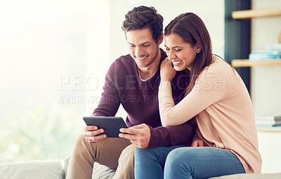 Buy stock photo Happy, couple and relax with tablet in in living room for social media, news or streaming video together. Digital technology, man and woman on sofa for online shopping or reading blog on app in home