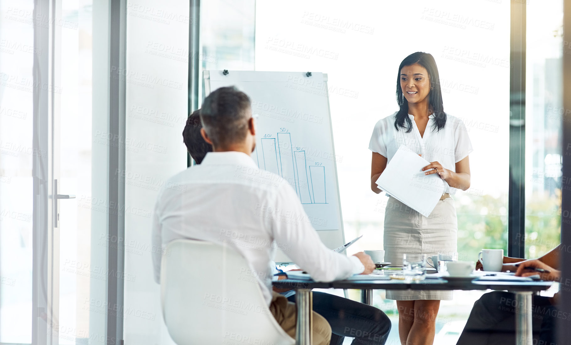 Buy stock photo Woman, business and diversity in boardroom for meeting or presentation, manager or leader with collaboration. Female person and colleagues in office for planning or teamwork, discussion for strategy