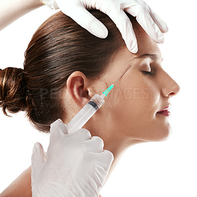 Buy stock photo Woman, hand and injection for eyebrow plastic surgery as cosmetic procedure, face lift or white background. Female person, needle and treatment or anti aging filler for wrinkles, mockup or studio