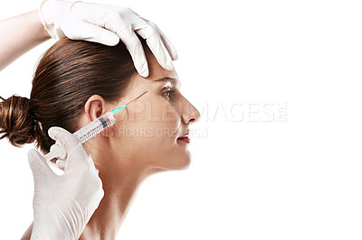 Buy stock photo Woman, beauty and dermatology with syringe for anti aging, needle and cosmetics or skincare by white background. Patient, injection and facelift in studio for filler with results, collagen and glow