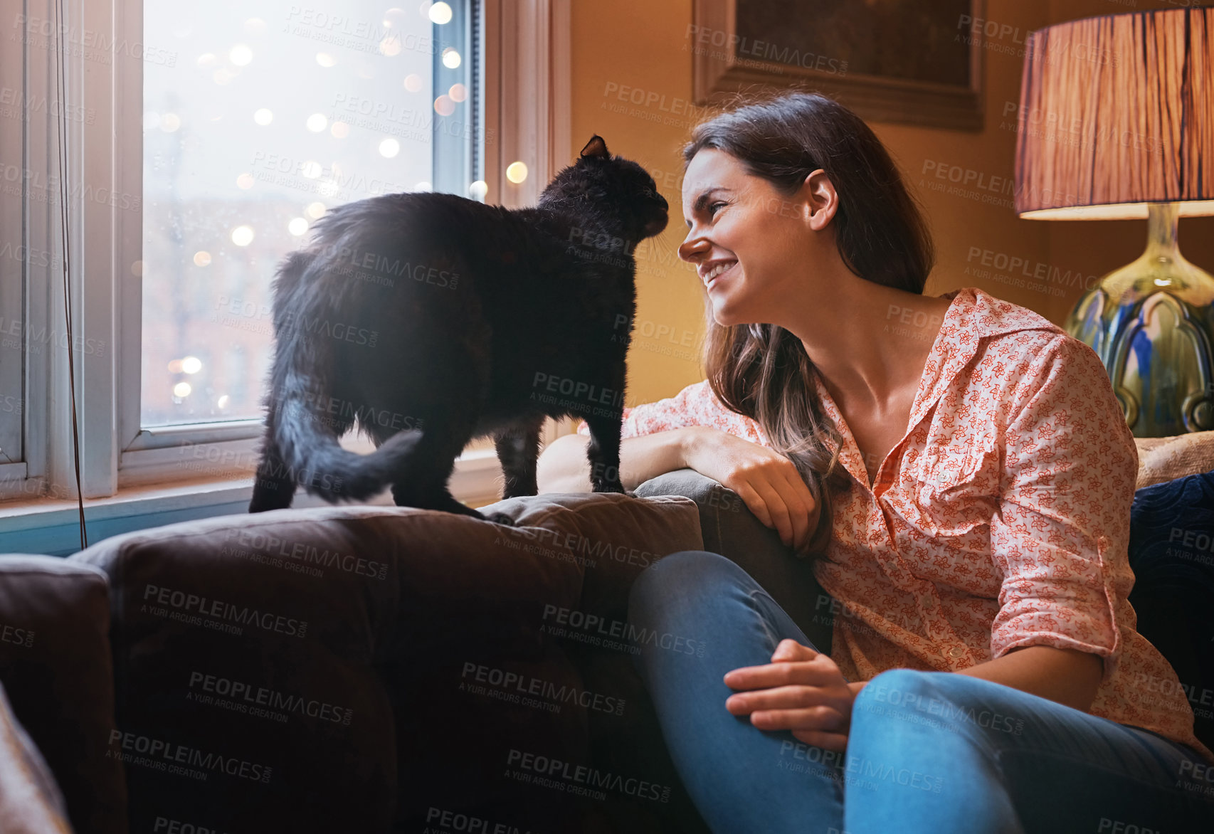 Buy stock photo Cat, woman and love on sofa at house with animal bonding, care and relax or fluffy friend for petting massage. Smile, female owner and kitten pet with stroke, calm and affection in living room