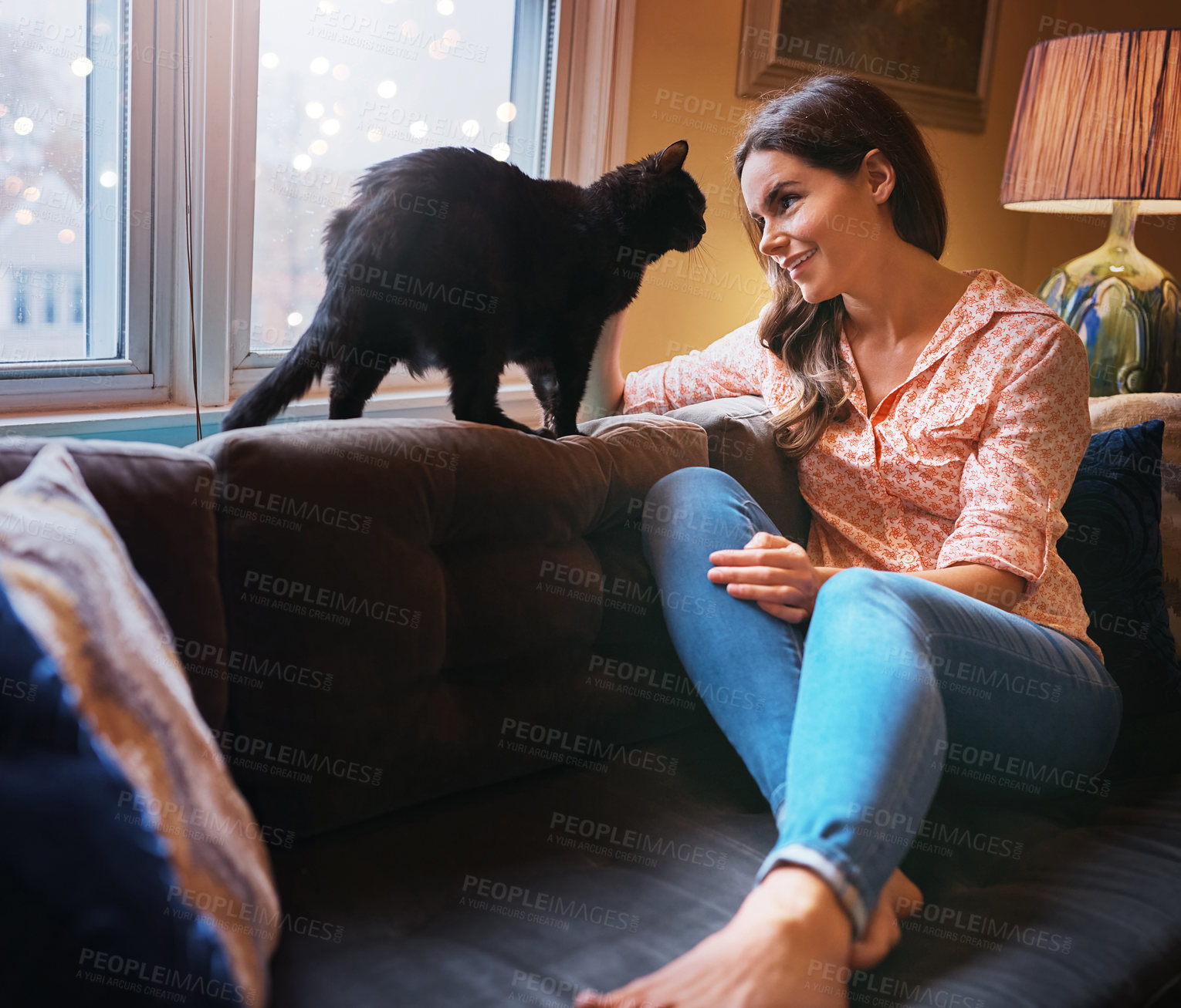 Buy stock photo Woman, cat and petting for fur in home, scratch and support animal or companion for love on sofa. Female person, relax and calm owner in living room to stroke pet, bonding and connection for loyalty