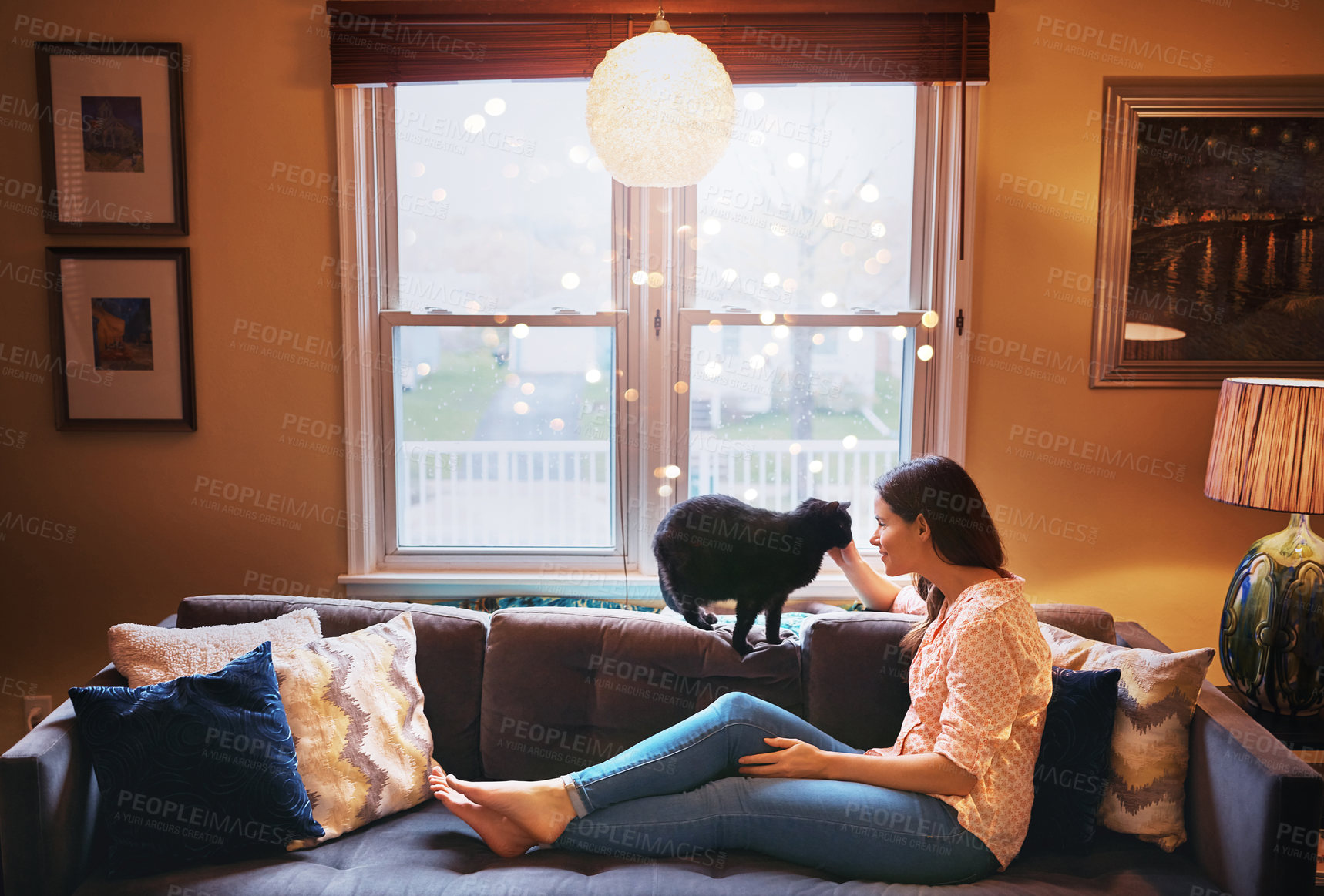 Buy stock photo Woman, care and cat on sofa at house with animal bonding, love and relax or fluffy friend for petting massage. Smile, female owner and kitten pet with stroke, hug and affection in living room