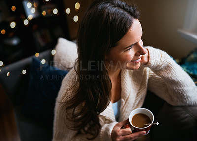 Buy stock photo Living room, relax and woman with coffee on sofa for morning, self care or thinking on weekend at home. Top view, smile and female person with warm caffeine beverage for wonder, peace or satisfaction