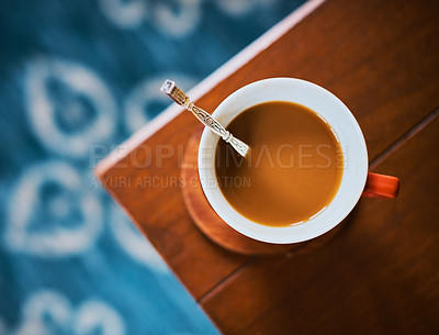 Buy stock photo High angle shot of a cup of coffee on a table