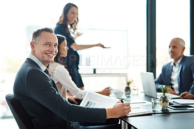 Buy stock photo Portrait, smile and business man writing notes in meeting, about us and coworking with office team. Face, happy professional and group with documents, data or statistics for financial advisor on book