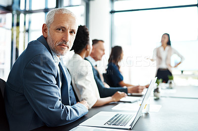 Buy stock photo CEO, mature man and laptop in boardroom, meeting and listening to presentation by employee for team. Portrait, boss and online for project, collaboration and strategy for deal, editor and publishing