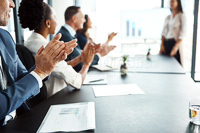Buy stock photo Cropped shot of businesspeople applauding a colleague during a presentation in the boardroom
