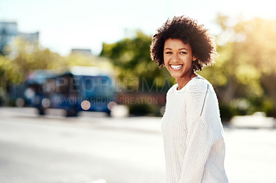 Buy stock photo Portrait, girl and smile in crossing street, outdoor and afro in urban, fashion and natural hair. Winter wear, city and happiness or african woman, road and confident in cheerful, vacation and bokeh