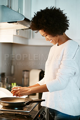Buy stock photo Black woman, egg and cooking on stove in home, frying pan and meal preparation in kitchen. Female person, apartment and nutrition in food, protein diet and skill for cuisine on gas for dinner routine