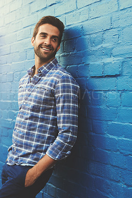 Buy stock photo Man, relax or lean against wall background with smile, casual fashion and positivity with blue aesthetic. Confidence, pride and cool model in checkered shirt, style and lumberjack outfit in Australia