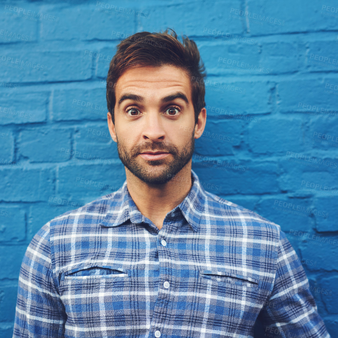 Buy stock photo Fashion, shock or man in wall background portrait for edgy clothes, blue or elegant style in Italy. City, surprise or stylish guy in urban town in trendy outfit with omg, wow or wtf face expression