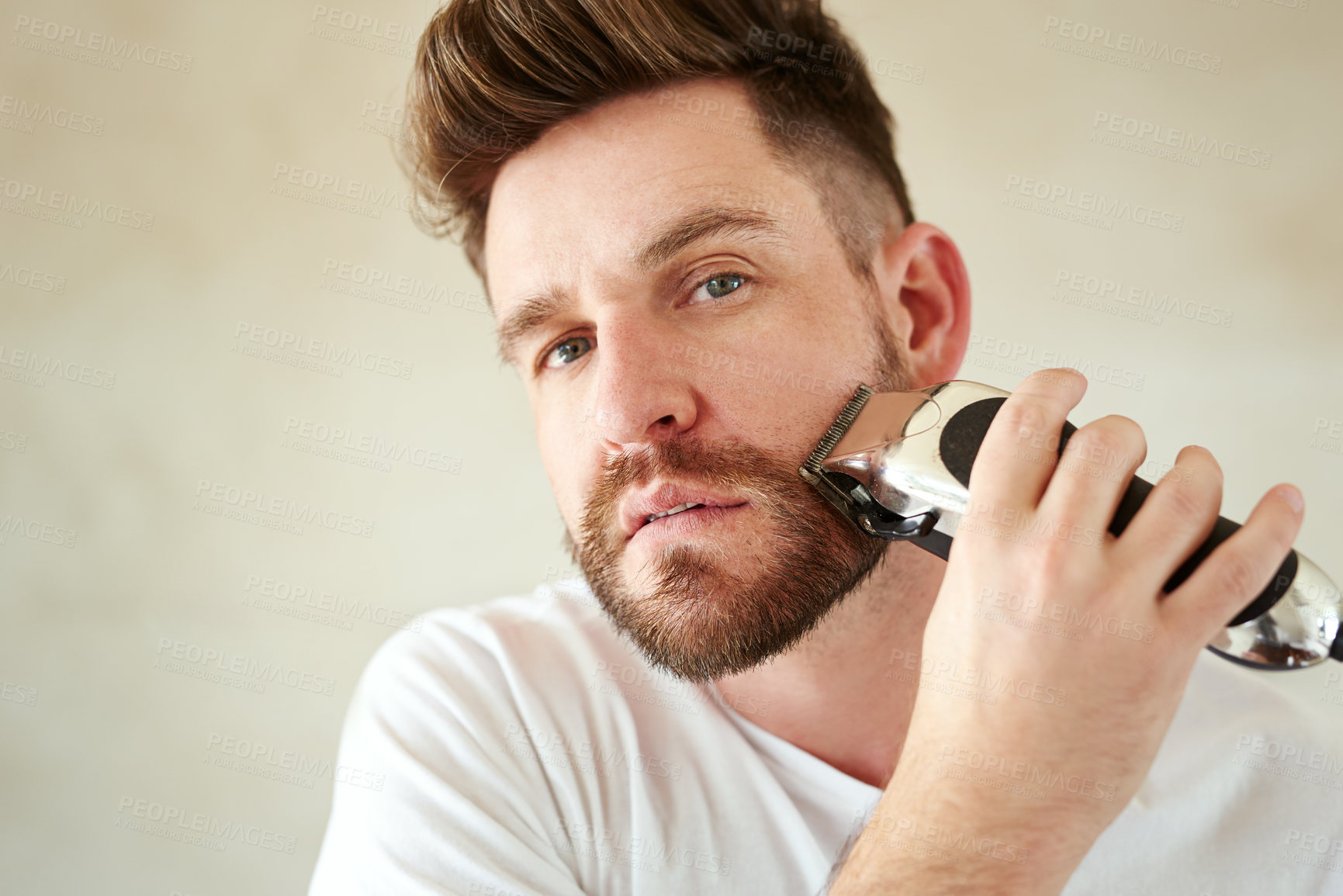 Buy stock photo Man, portrait and electric shaver in home bathroom for grooming, skincare or morning routine for wellness. Face, cleaning beard and person with trimmer for beauty, health or hair removal for hygiene