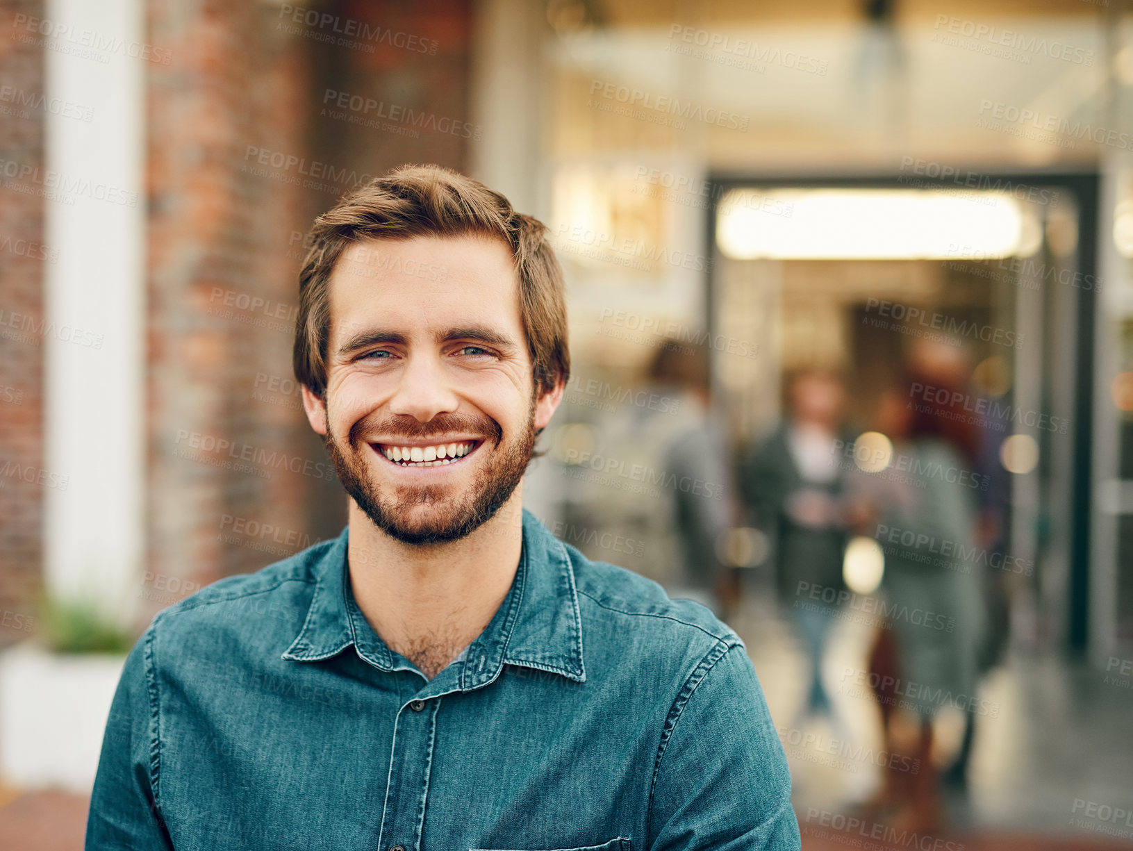 Buy stock photo Portrait of a happy young man standing outdoors on campus
