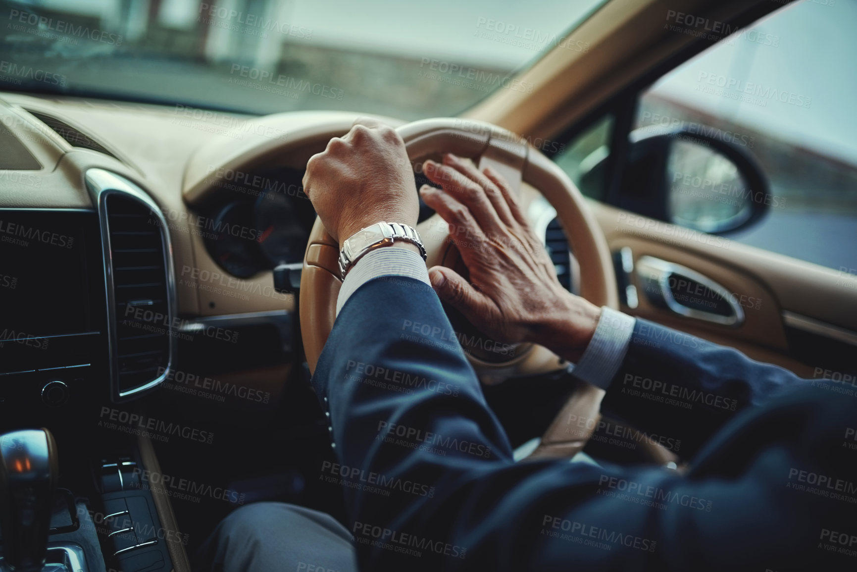 Buy stock photo Cropped shot of a businessman pressing the hooter on a steering wheel