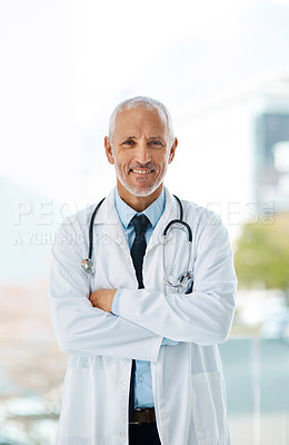Buy stock photo Doctor, confidence and portrait of mature man in a hospital at cardiology clinic with arms crossed. Professional, medical employee and stethoscope with healthcare, job and cardiologist consultant
