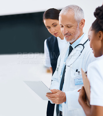 Buy stock photo Mature man, tablet and medical report success in a hospital with doctor with healthcare workers with tech. Clinic, cardiology research and digital data with smile and collaboration with discussion