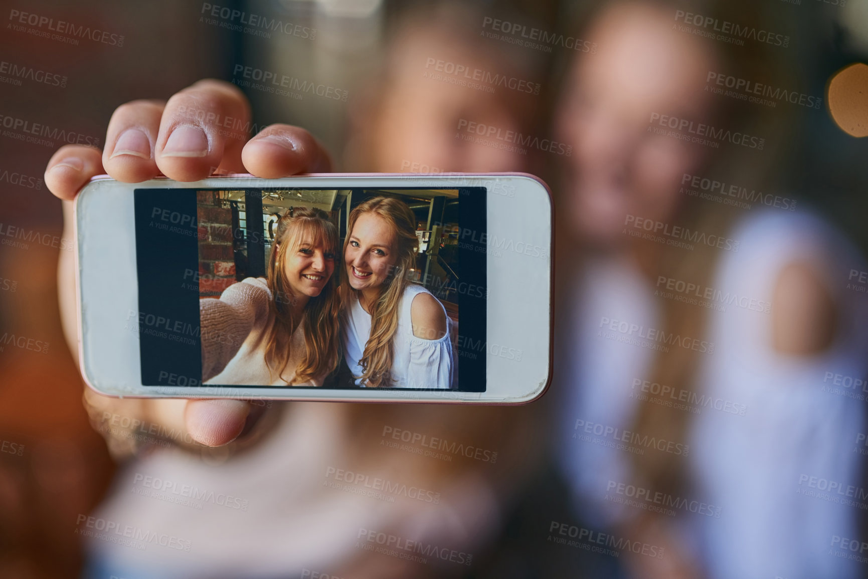 Buy stock photo Phone screen, women and selfie of happy friends in coffee shop for relax, hangout or meeting. Girls, mobile and picture in cafe for blog post, memory and influencer live streaming with hand closeup