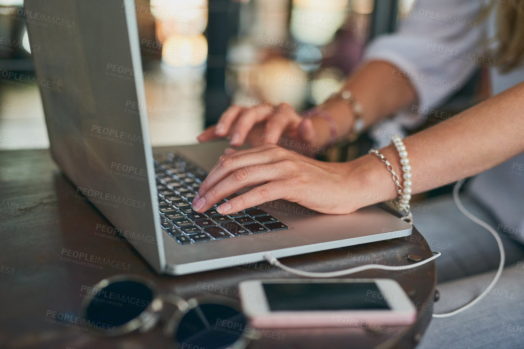 Buy stock photo Hands, laptop and woman in coffee shop for remote work, online research and planning for blog project. Person, customer or freelancer in closeup at cafe or restaurant for research, news or article