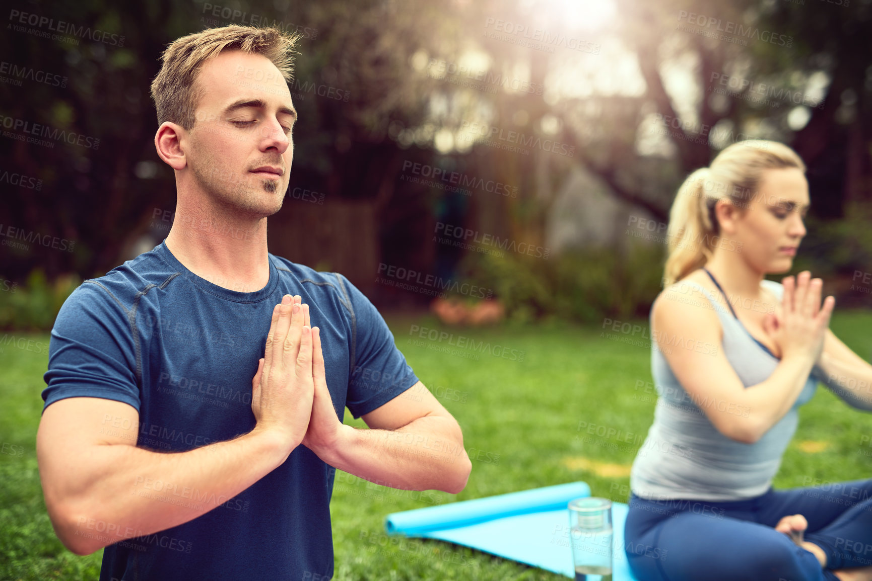 Buy stock photo Outdoor, couple and eyes closed for meditation with namaste for peace, mindfulness and wellness. People, relationship and serious with peace, calm and break with hobby for health in California