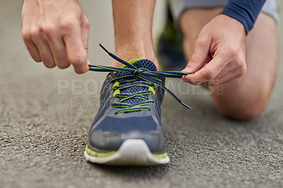 Buy stock photo Person, hands and tying shoes with laces for fitness, workout preparation or training on road or street. Closeup, athlete or runner with tie, sneakers or getting ready for running, cardio or health