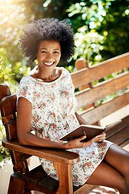 Buy stock photo African woman, smile and book on park bench in portrait to relax on vacation with story, language and learning. Girl, person and happy for reading, literature and holiday with sunshine in Atlanta
