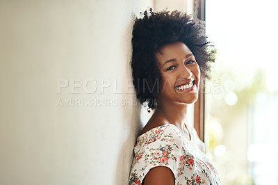 Buy stock photo Portrait of a happy young woman spending a relaxing day at home