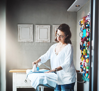 Buy stock photo Woman, chore and ironing with clothes at house for responsibility of clean laundry for husband. Female person, help and household with chores for hygiene, work and care as reliable housewife 