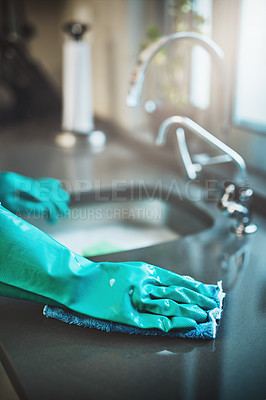 Buy stock photo Hand, glove and kitchen with sink, cleaning and home routine for hygiene and responsibility. Housekeeping, faucet and washing for countertop, polishing and cloth for scrub with domestic housework