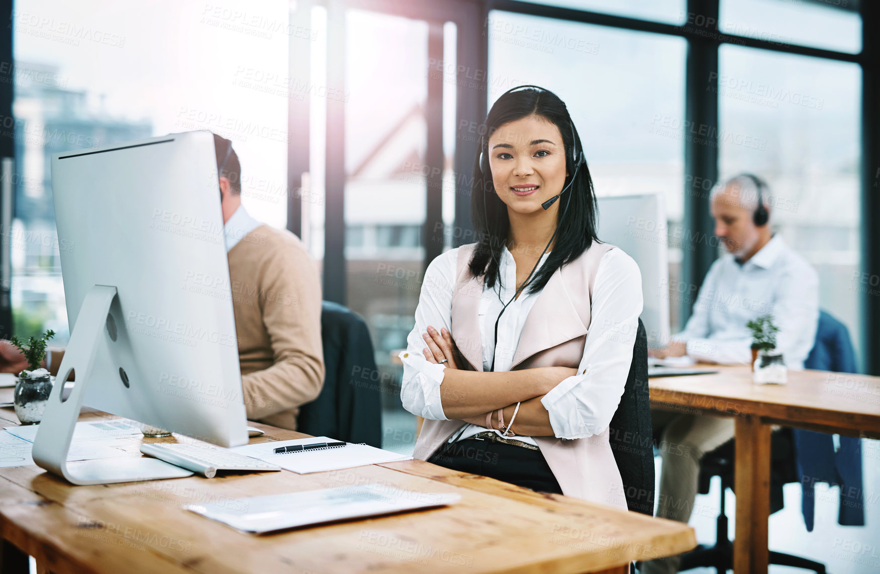 Buy stock photo Call center, portrait and asian woman with smile, telemarketing and service at the office. Headsets, happy and arms crossed for sales consultant, communication and online, support and advice

