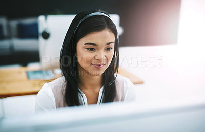 Buy stock photo Phone call, smile and Asian woman at computer in customer support, help desk or telemarketing office. Headset, online consultation and client service agent in callcenter for crm, advice or sales.