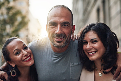 Buy stock photo Shot of three friends having fun while out in the city