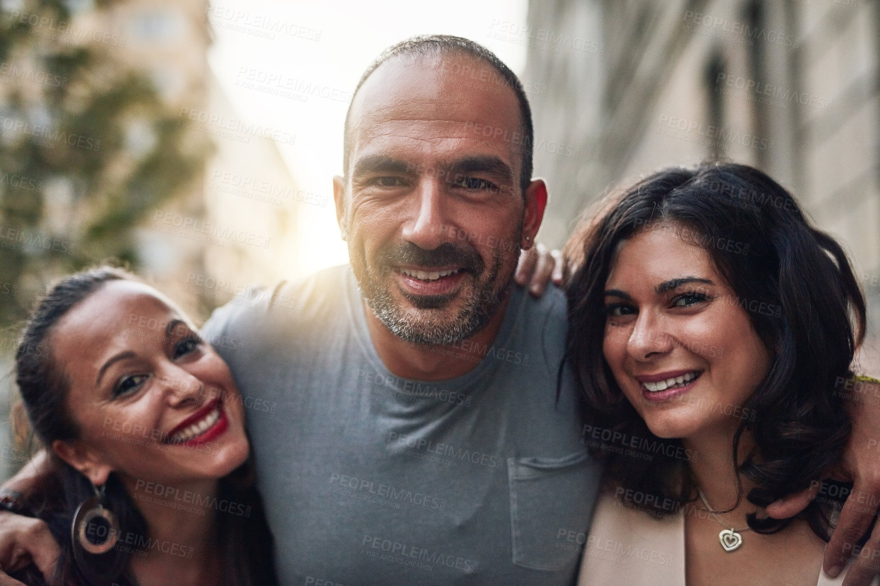 Buy stock photo Shot of three friends having fun while out in the city