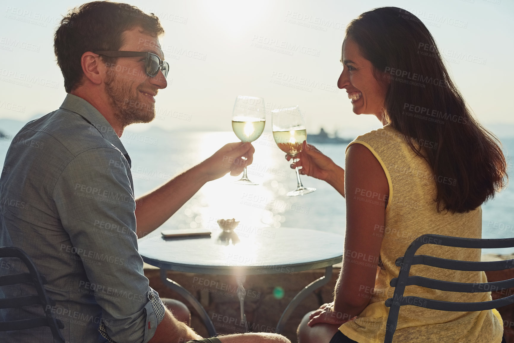 Buy stock photo Cropped shot of a happy couple out on a romantic date