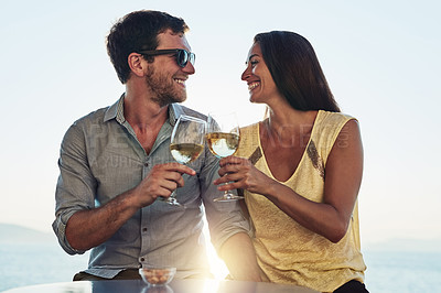 Buy stock photo Cropped shot of a happy couple out on a romantic date