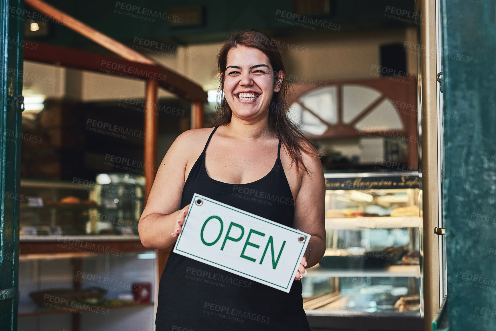 Buy stock photo Bakery, open sign and portrait of woman in store for small business, entrepreneur and restaurant. Coffee shop manager, barista and waitress with person for food service, server and hospitality